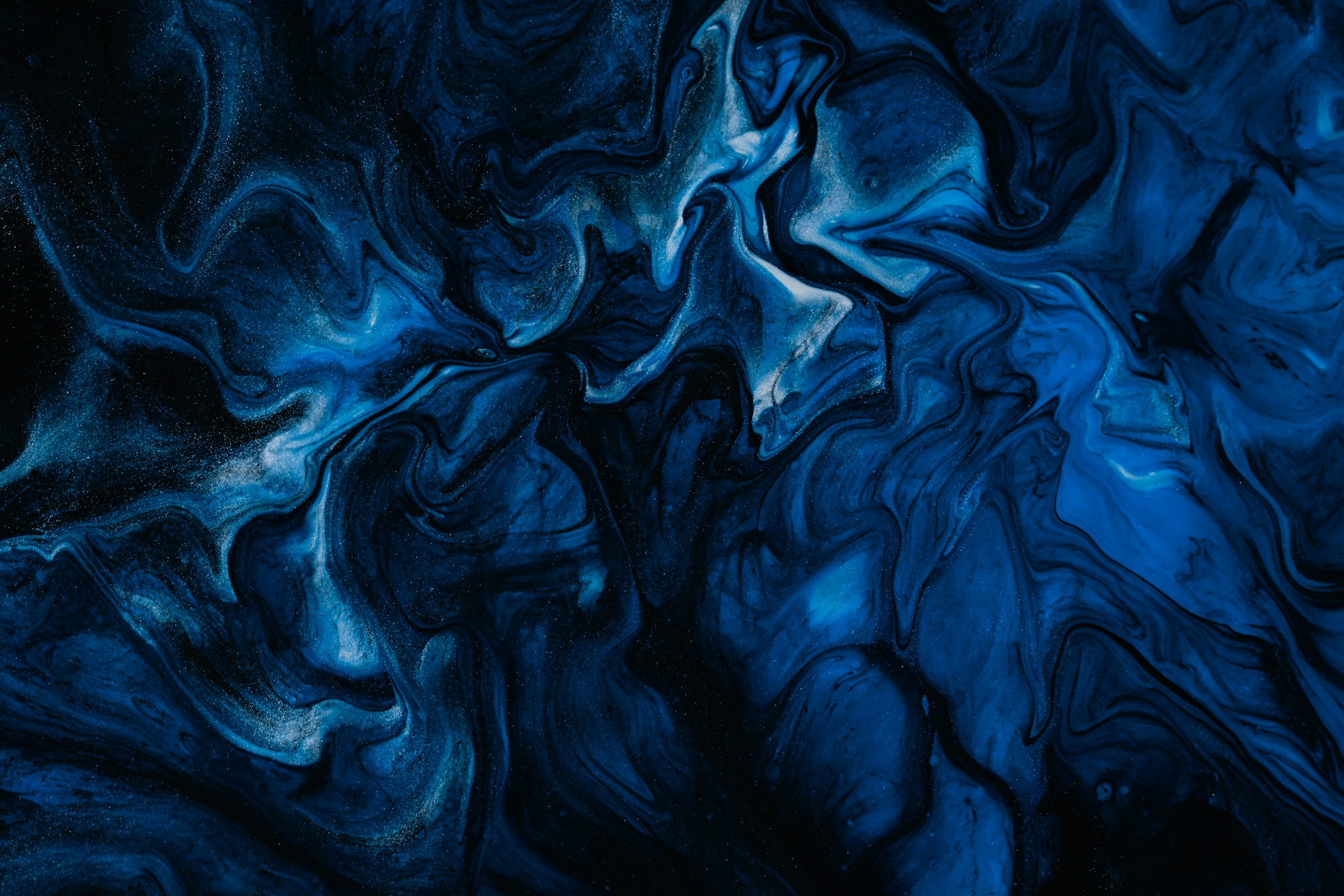 Black and blue abstract photo by Pawel Czerwinski for Unsplash