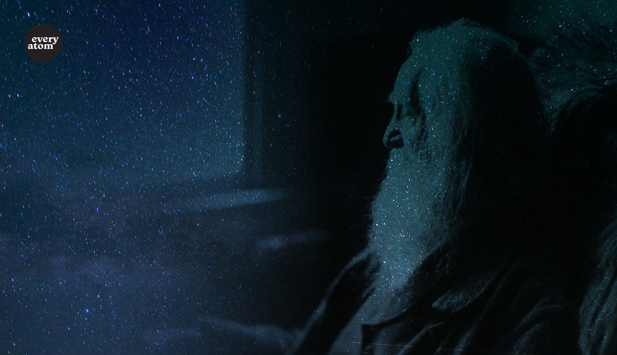 Whitman against the night sky.