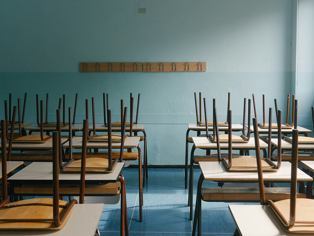 empty classroom, chairs on desks