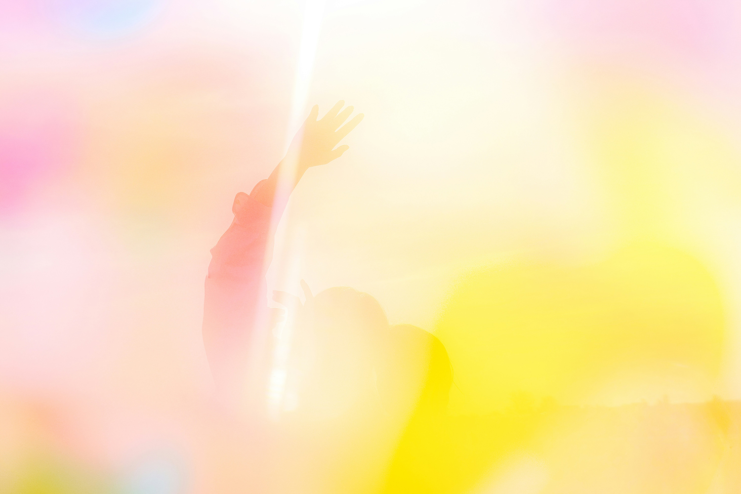 Person Waving in Overexposed Yellow Filter