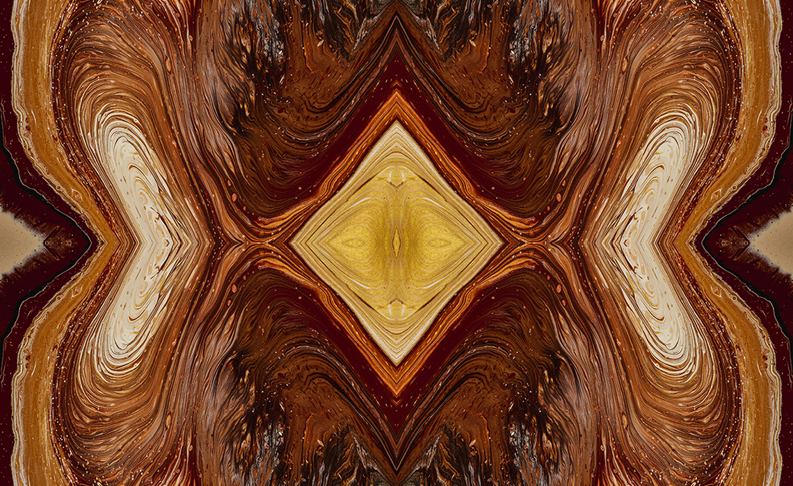 abstract swirls of brown, orange, and yellow