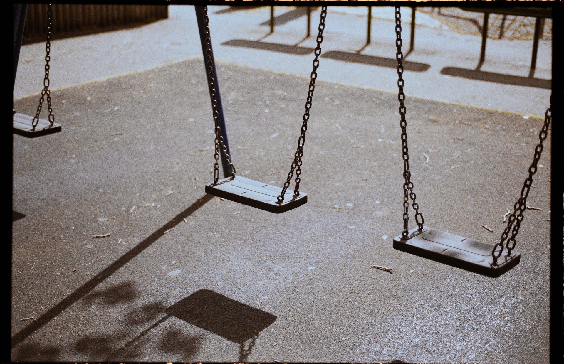 swings on kodak portra 400 by CJ for Unsplash+