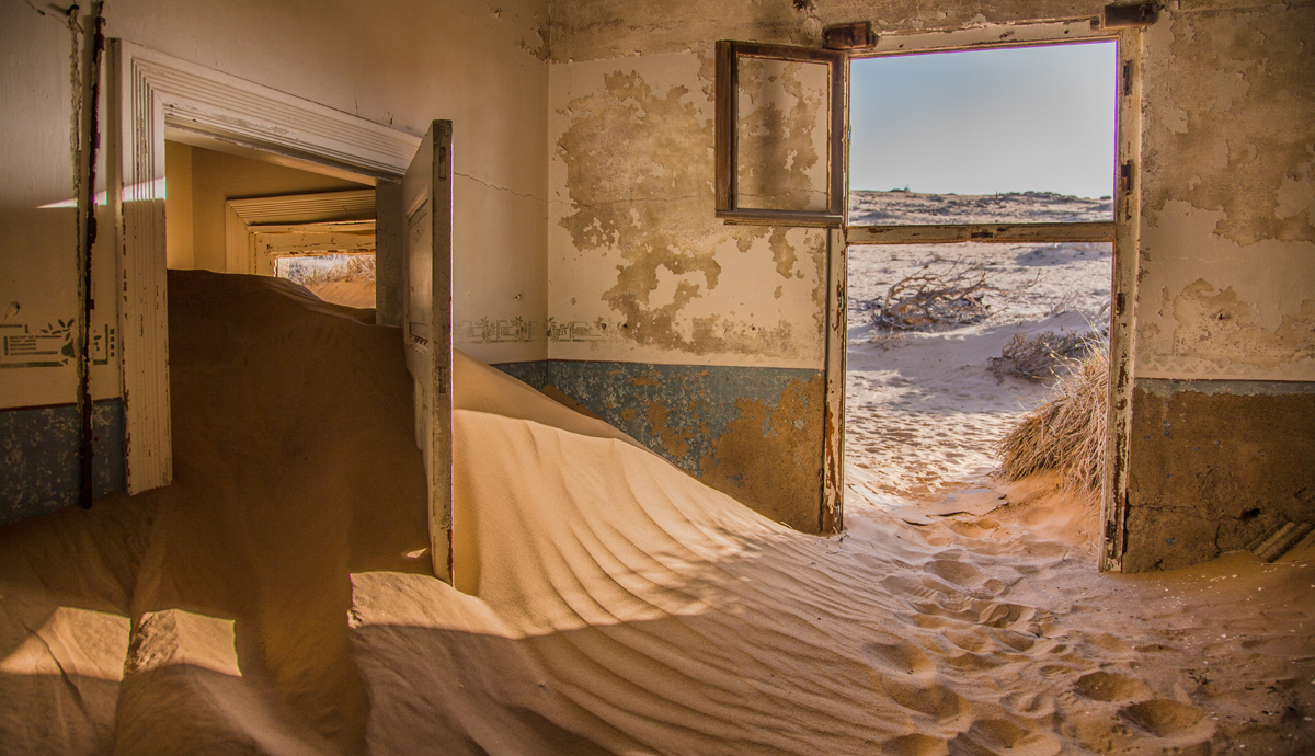 Abandoned house full of sand