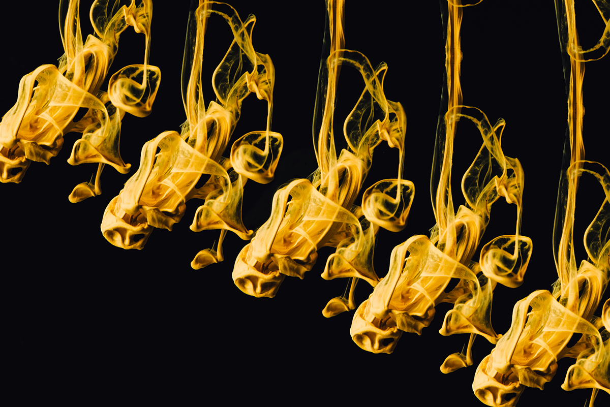 golden smoke on black background