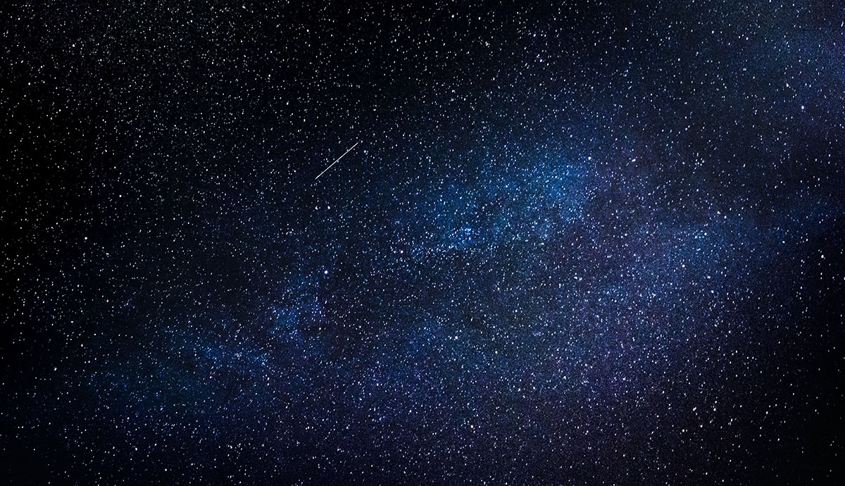 Header Graphic: picture of the night sky showing the Milky Way and a shooting star | Image Credit: Federico Beccari