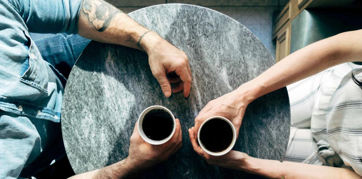 two individuals with coffee