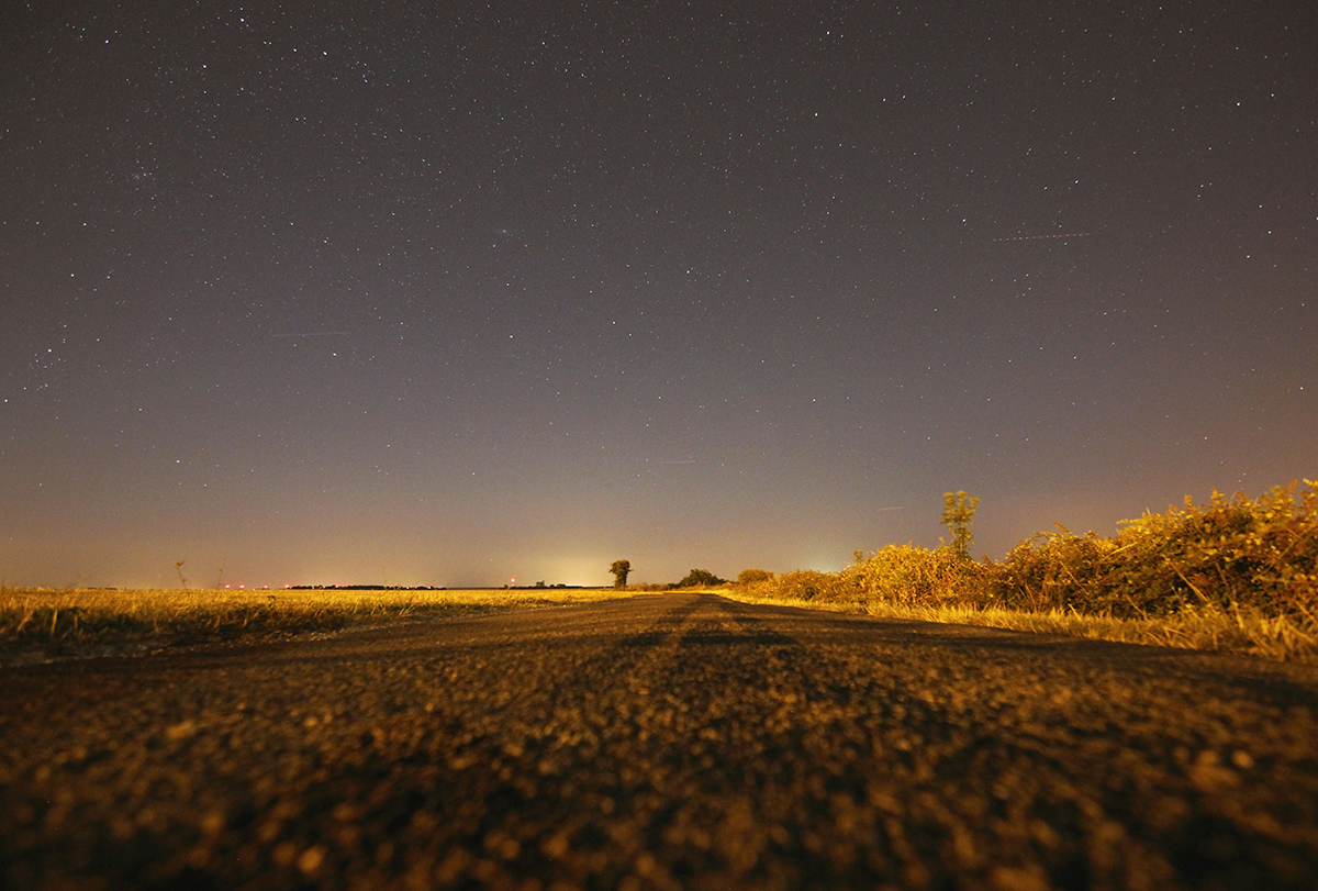 highway at night with stars