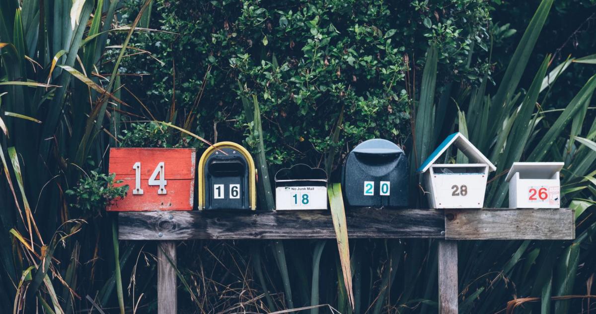 Image of mailboxes against greenery