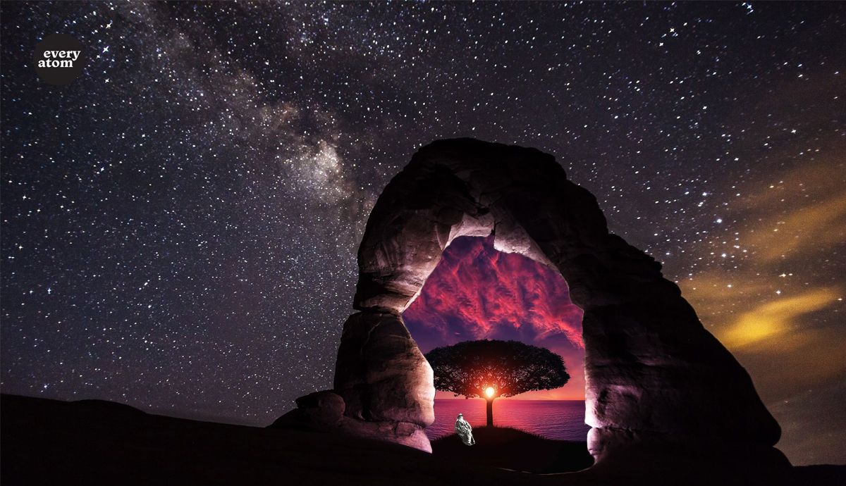 a colorful scene through a stone arch