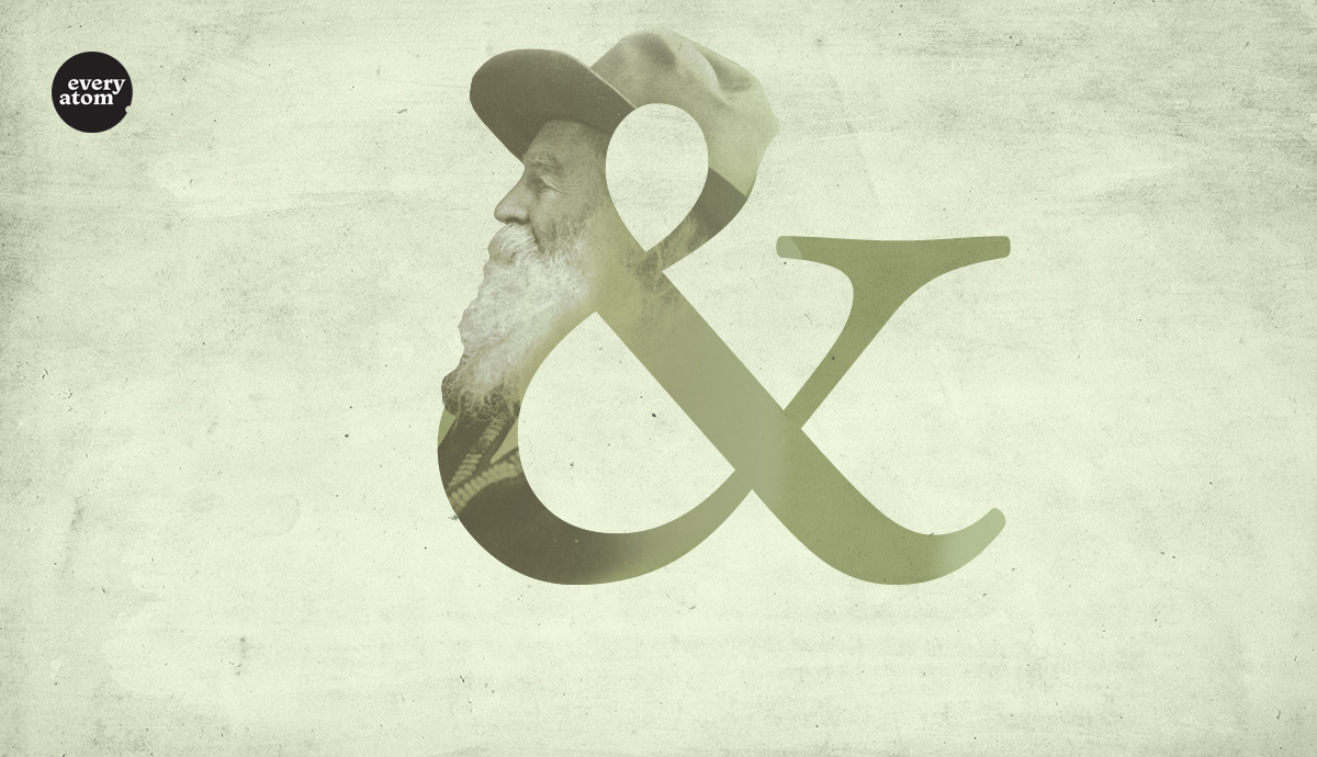 "&" symbol with Whitman's face therein