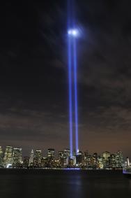 Twin beams of light illuminate the skies over New York City, N.Y., in the Tribute in Light. Photo by Kenn Mann.