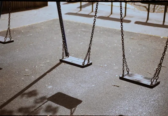 swings on kodak portra 400 by CJ for Unsplash+
