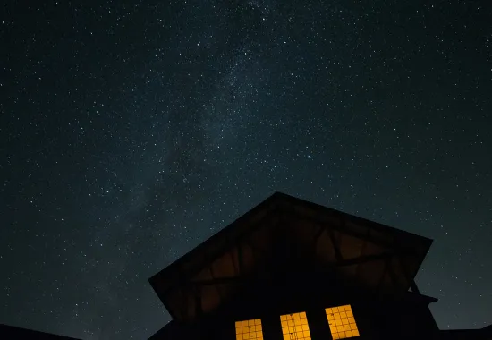 dark house with night sky