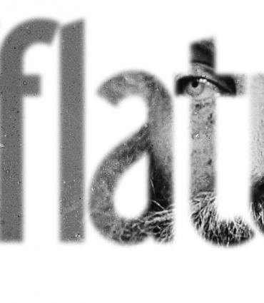 The word "Afflatus" with Whitman shown through it