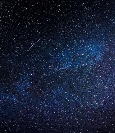 Header Graphic: picture of the night sky showing the Milky Way and a shooting star | Image Credit: Federico Beccari