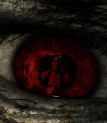 Dark eye with red iris with image of a Native American inside