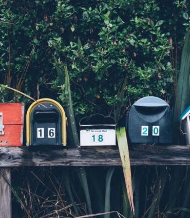 Image of mailboxes against greenery