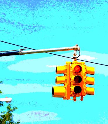 Header Graphic: Saturated and posterized image of a city stop light | Image Credit: Unsplash