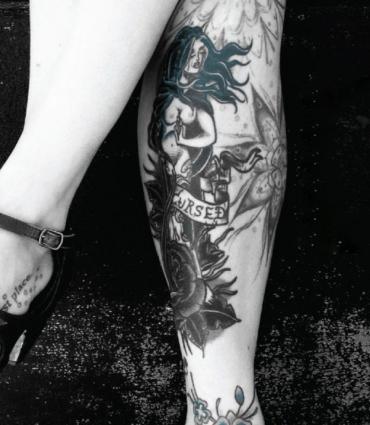 Image of tattooed legs from book cover