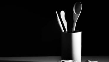 White and black photo of kitchen utensils | Rae Wallis
