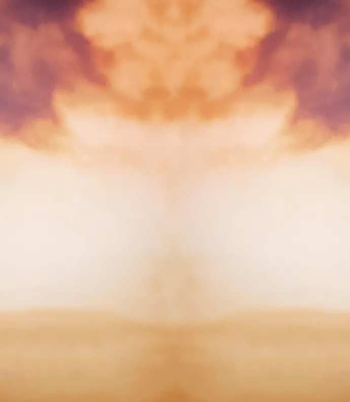 A sunset with a cloud in the center.