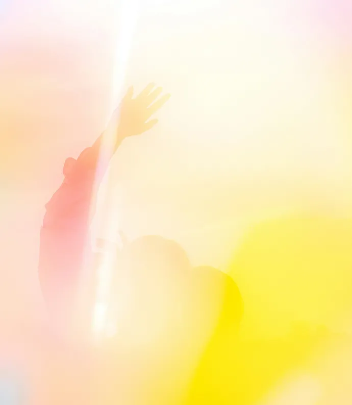 Person Waving in Overexposed Yellow Filter