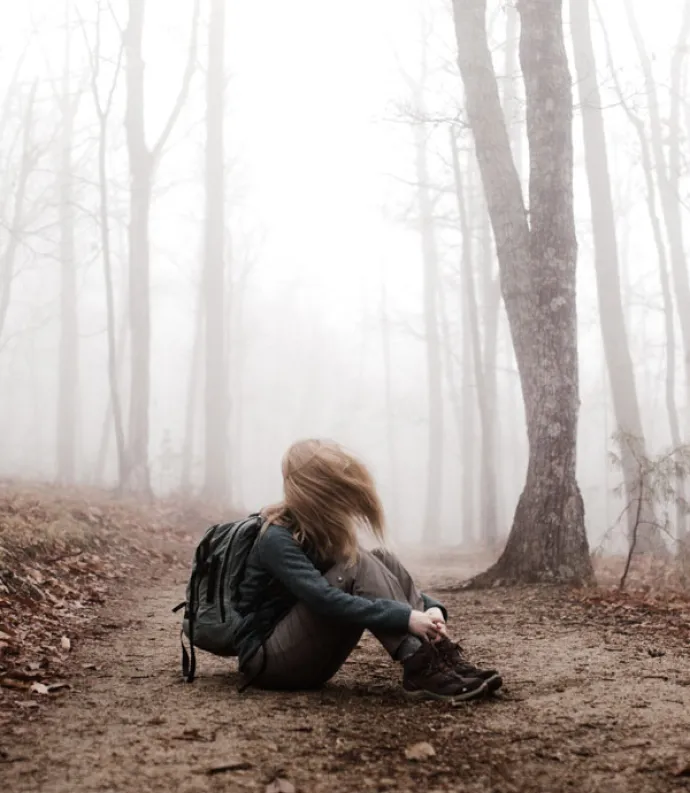Woman sitting on land | Andrew Neel