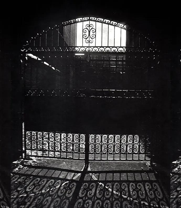 Black and white photo of a gate