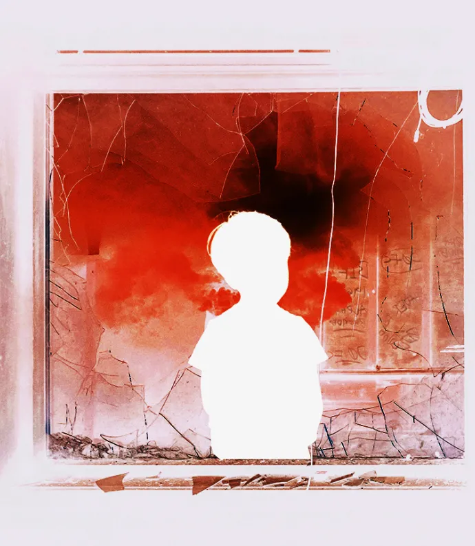 boy in broken window with red smoke