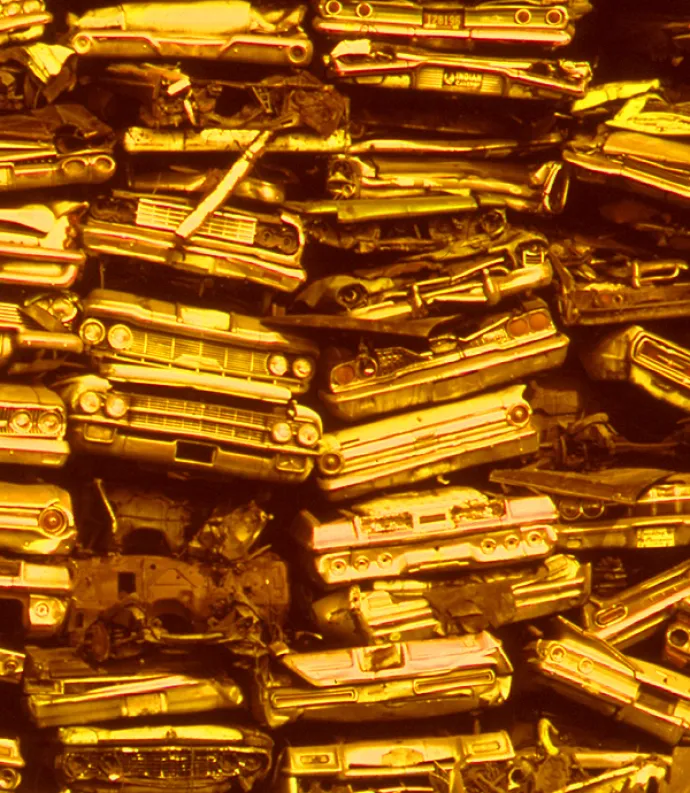 Stack of cars in junkyard