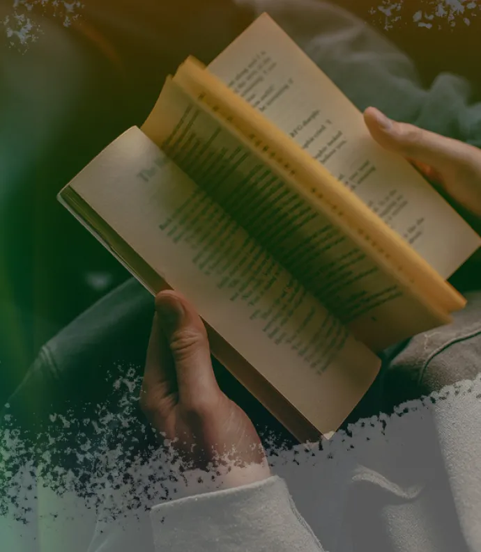an individual reading a book