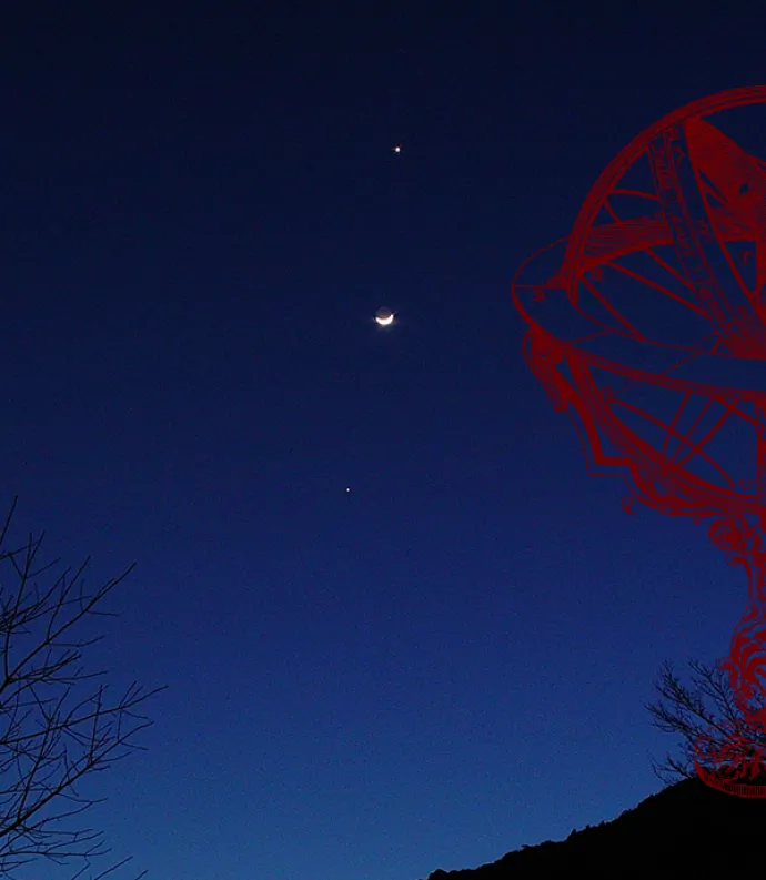 Armillary sphere against the night sky
