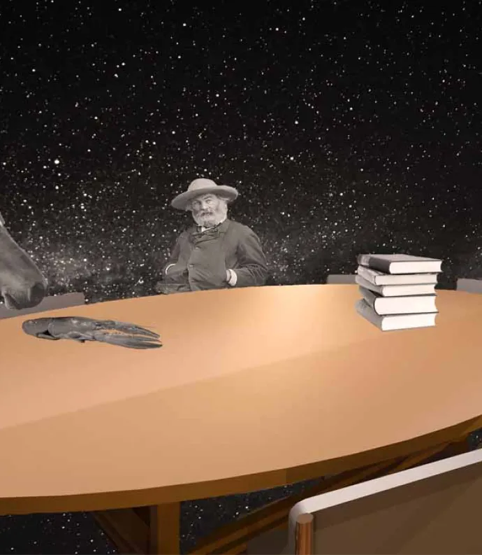 Whitman sitting at a table with some animals