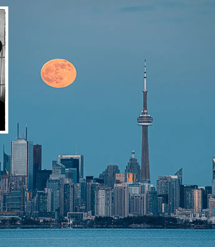 Black and White Photo of Grant Tracey placed on top of the Toronto skyline