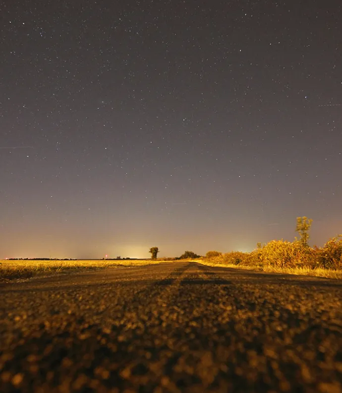 highway at night with stars
