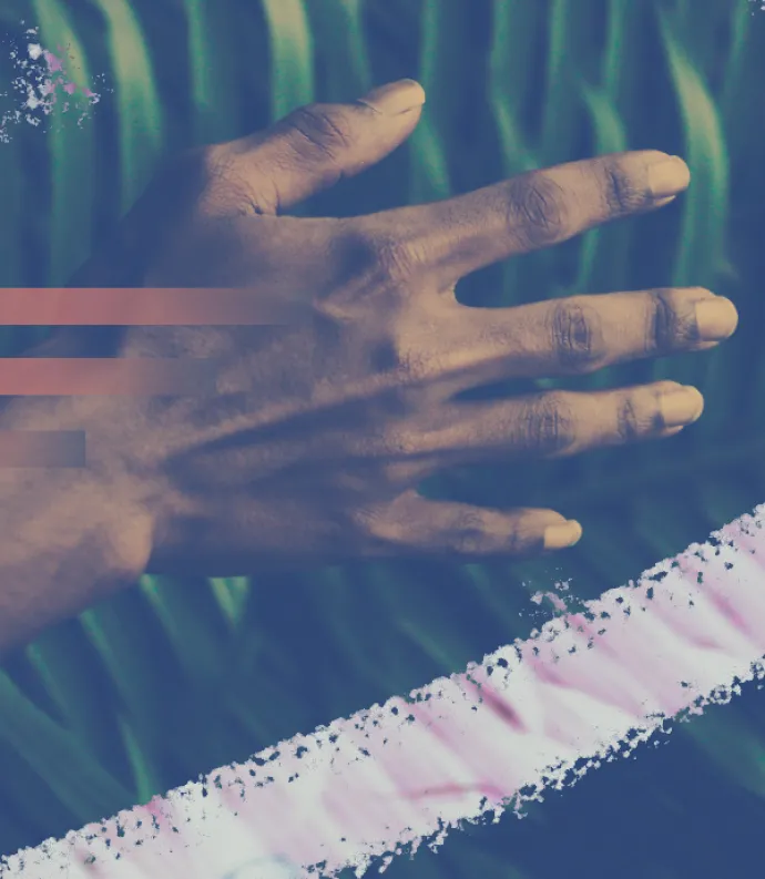 a hand caressing a leaf