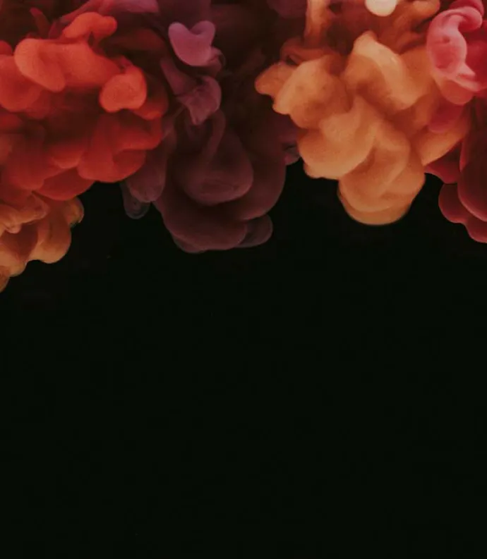 Red clouds on a black background