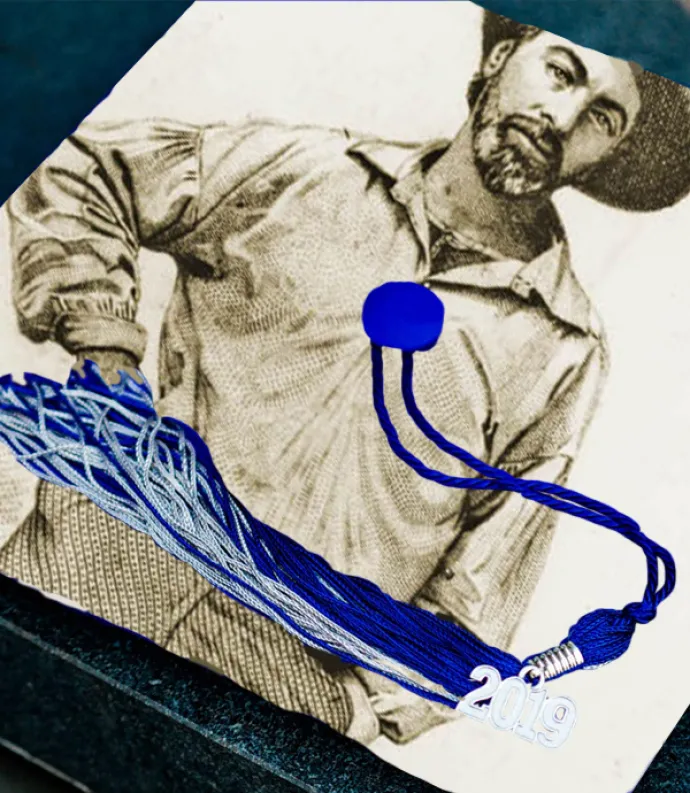 a graduation cap with whitman