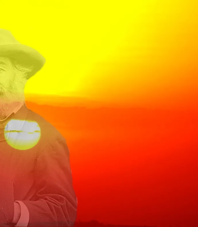 whitman in front of a sunrise