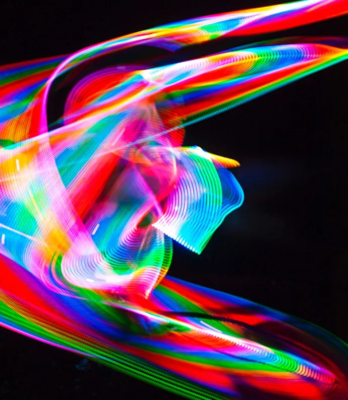 Multi-hued projection on black background