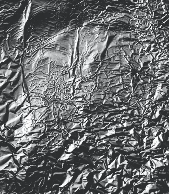 Silver texture photo by Universal Eye on Unsplash